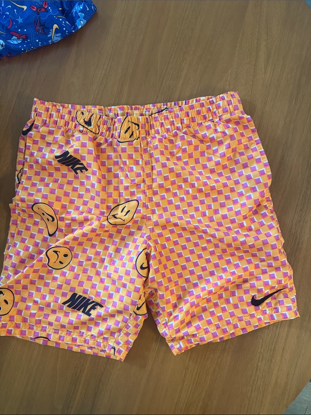 Nike Boys Swim Shorts. 7inch. Clean and good condition.
